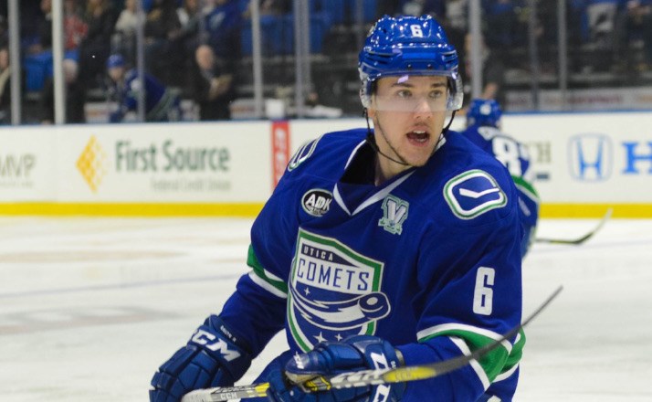 Ashton Sautner calls for the puck with the Utica Comets