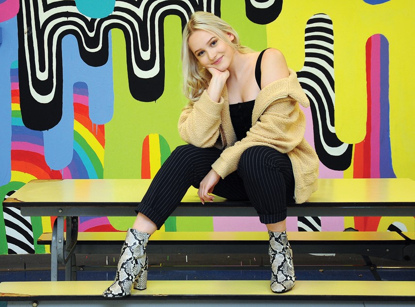 Kat Beck is singing Canada’s national anthem before this year’s Buchanan Bowl 2018 at Carson Graham Secondary School, the annual varsity football game between Handsworth and Carson, on Saturday, Sept. 29 at 1:15 p.m.