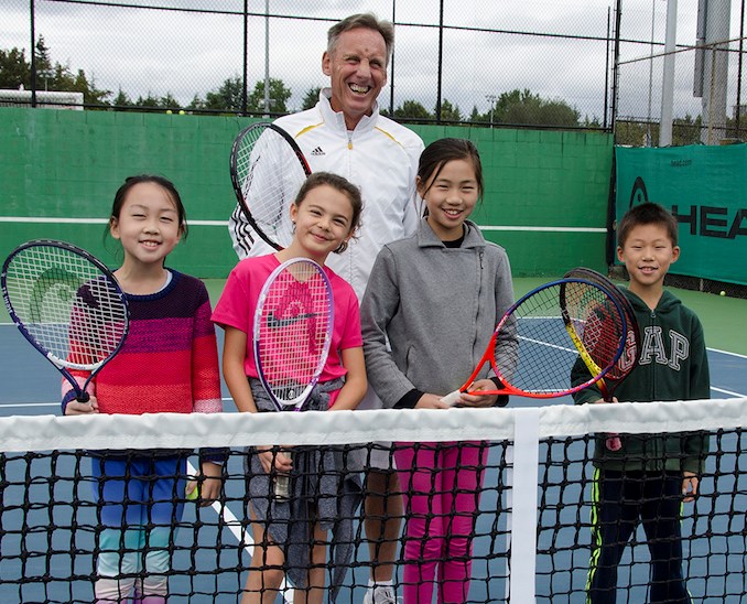 Coach Howie Jackson had his Gold Star juniors put on a demonstration during the Richmond Tennis Club's Open House last Sunday.