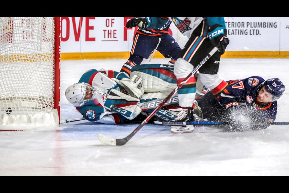 Kamloops Blazers’ forward Brodi Stuart collided with Kelowna Rockets’ goaltender James Porter at Sandman Centre on Friday. Executives from the Blazers, Rockets and Lethbridge Hurricanes will be pitted against each other in bids for the 2020 Memorial Cup on Wednesday in Calgary.