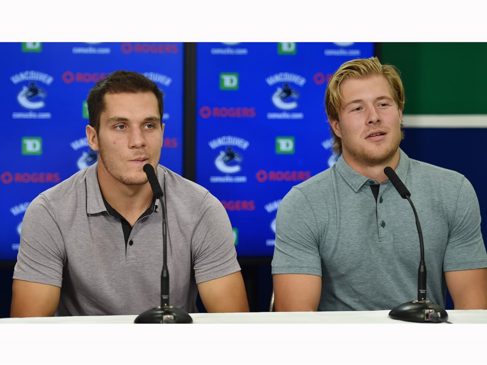 Bo Horvat and Brock Boeser of the Vancouver Canucks answer questions from the media.