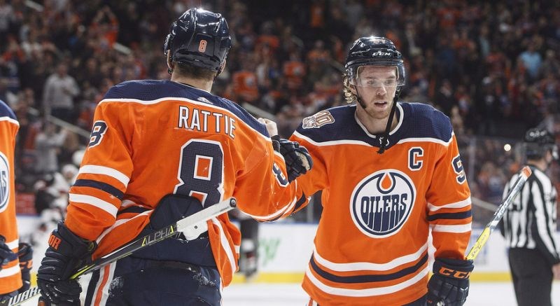 Ty Rattie and Connor McDavid celebrate a goal for the Edmonton Oilers