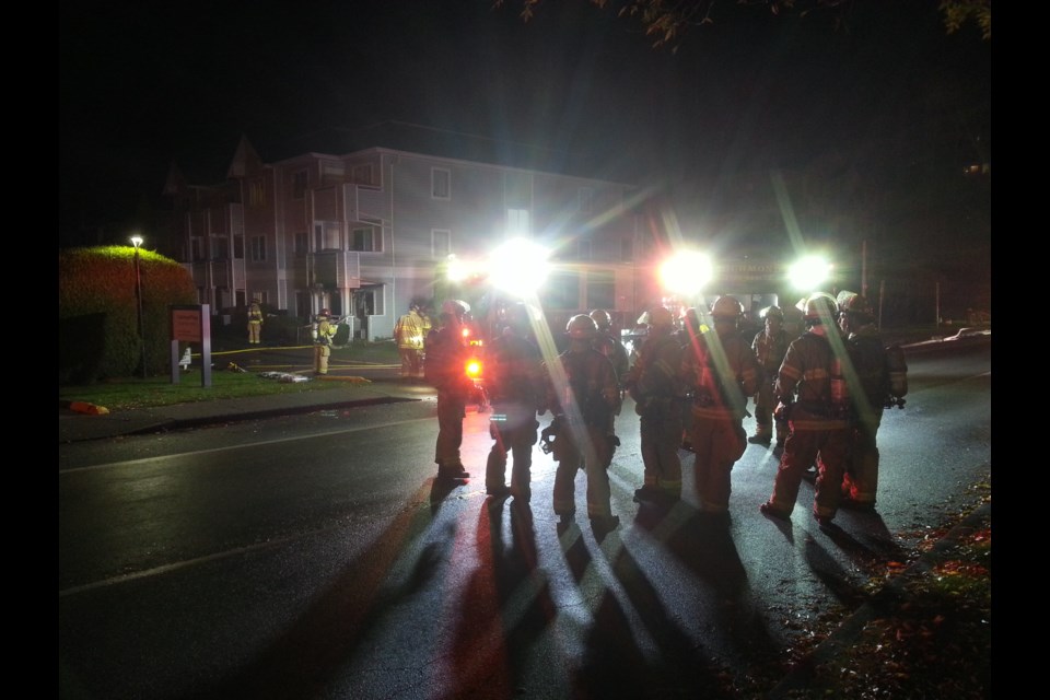 Firefighters attend a fire at Richmond's Cedarwood Place. Photo: Submitted