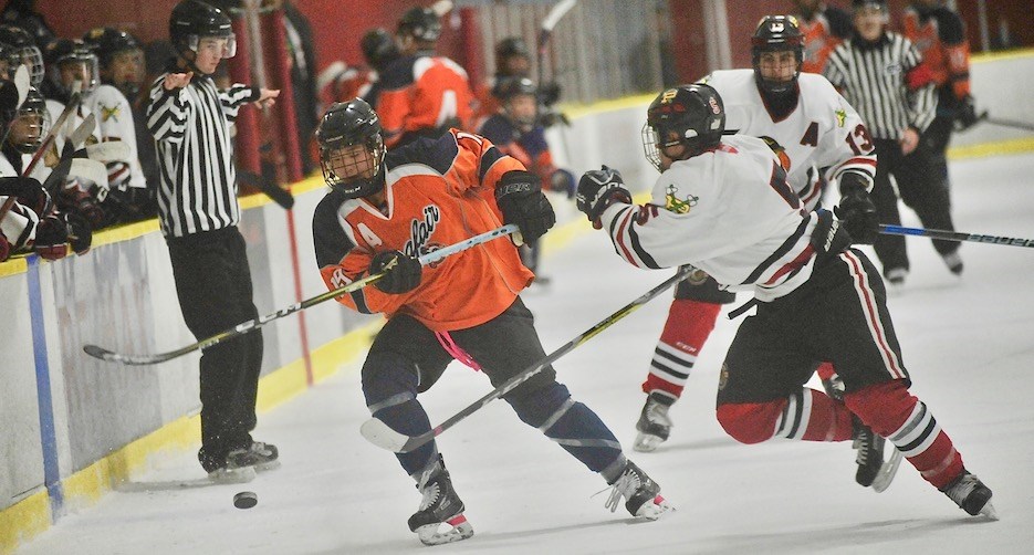 Richmond Jets battled their way to a 4-3 victory over the Portland Winterhawks on Monday afternoon in the Midget Tier One title game at the 16th annual Ice Breaker Tournament.