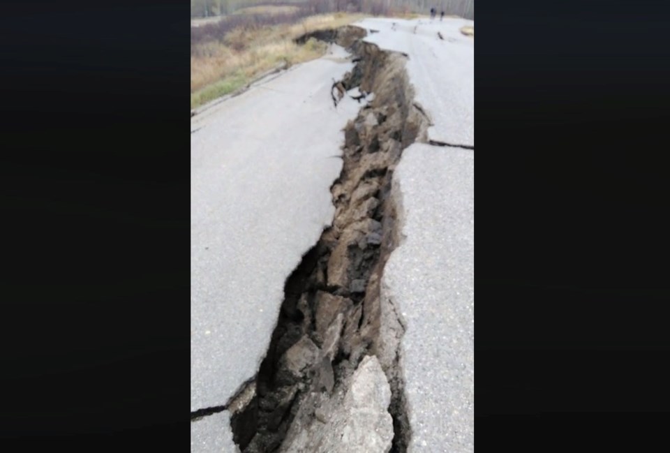 Damage to the road in Old Fort from a slow-moving landslide