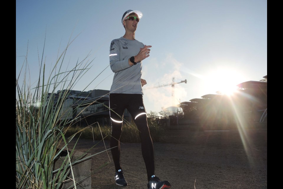 Richmond's Olympic race walker Evan Dunfee breezes past the Oval on Friday morning. He's walking 25K a day for 25 days to try and raise $25,000 for KidSport BC, which is celebrating its 25th anniversary. Dunfee is suggesting donations of, you guessed it, $25. Alan Campbell photos