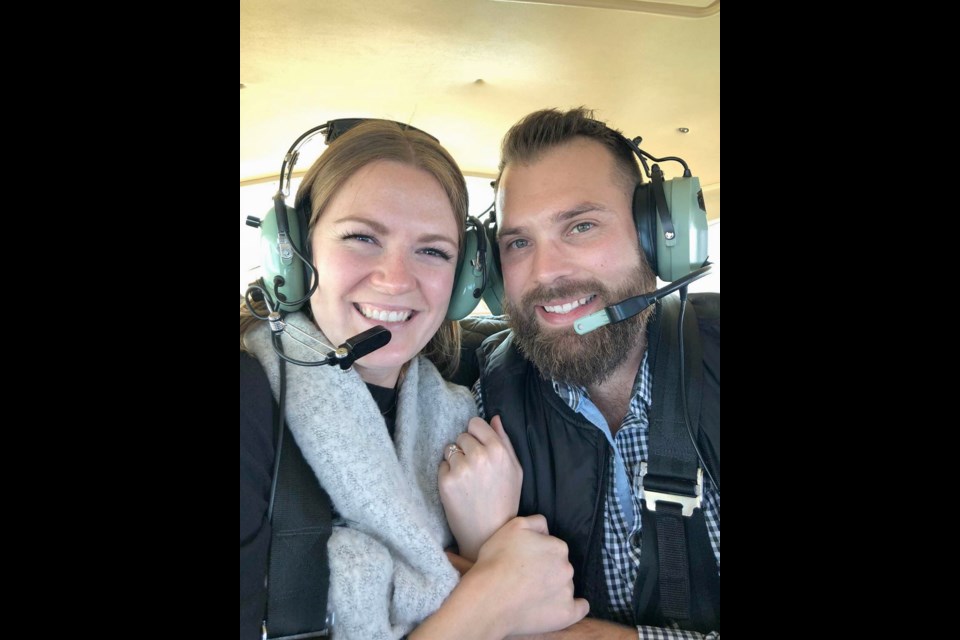 Jesse Seads proposed to Justine Aichelberger as they flew over message spelled out in pumpkin field below.