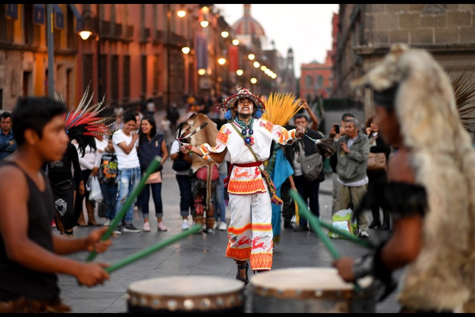 Aztec performer in Zocalo, the common name for the main square in Mexico City.