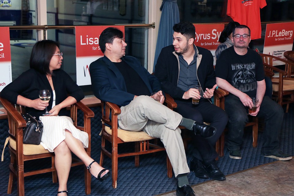 Independents Troy Hunter (second from left), Steve Tsonev and Benny Ogden at the New West Progressives night. All three independent candidates polled low in in Saturday's election.