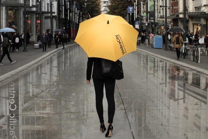 There are 23 kiosks offering 6,000 umbrellas for use in downtown Vancouver courtesy of UmbraCity.