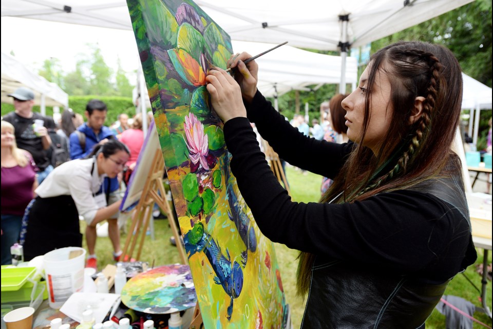 Sandra Trubin, seen here competing in the Park's Edge Paint Off in the summer, is one of the artists coming to the Deer Lake Craft Festival for the inaugural live painting competition.