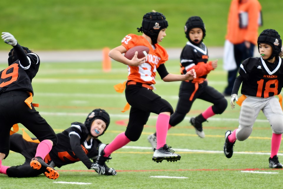 A brisk autumn day in New West became a cool day for football, as players for the Royal City Hyacks’ flag football teams Orange and Black took to Mercer Stadium for a game last Saturday.