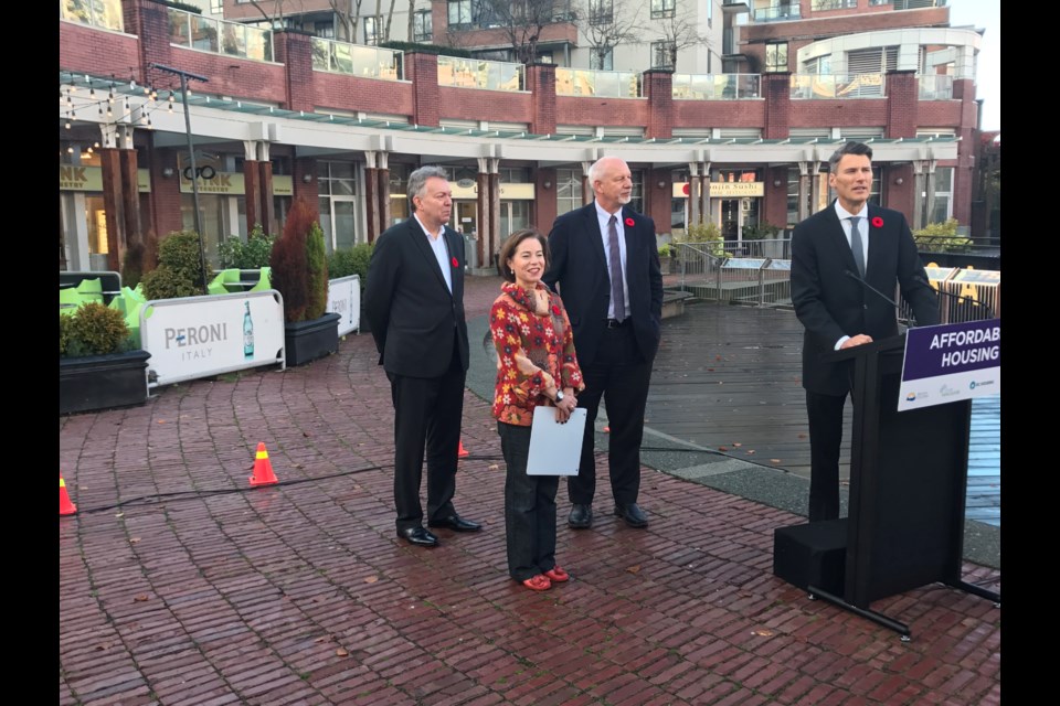 Concord Pacific owns six sites in the former Expo lands that have been undeveloped for decades. The proposal would see it transfer three of the sites to the City of Vancouver for social housing and retain ownership of the other three. Left to right: Matt Meehan, senior vice-president of planning for Concord Pacific; Selina Robinson, provincial minister of municipal affairs and housing; Gil Kelley, the City of Vancouver's chief planner; and Mayor Gregor Robertson. Photo Naoibh O'Connor