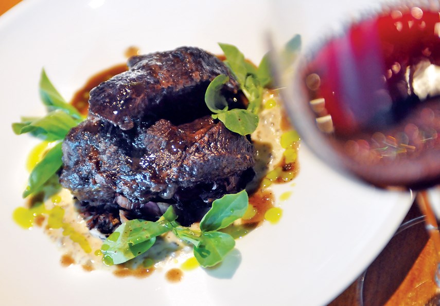 Beef cheeks braised 12 hours in a red wine reduction served with celery root puree, black truffle and grilled radicchio at West Vancouver's Terrior Kitchen.