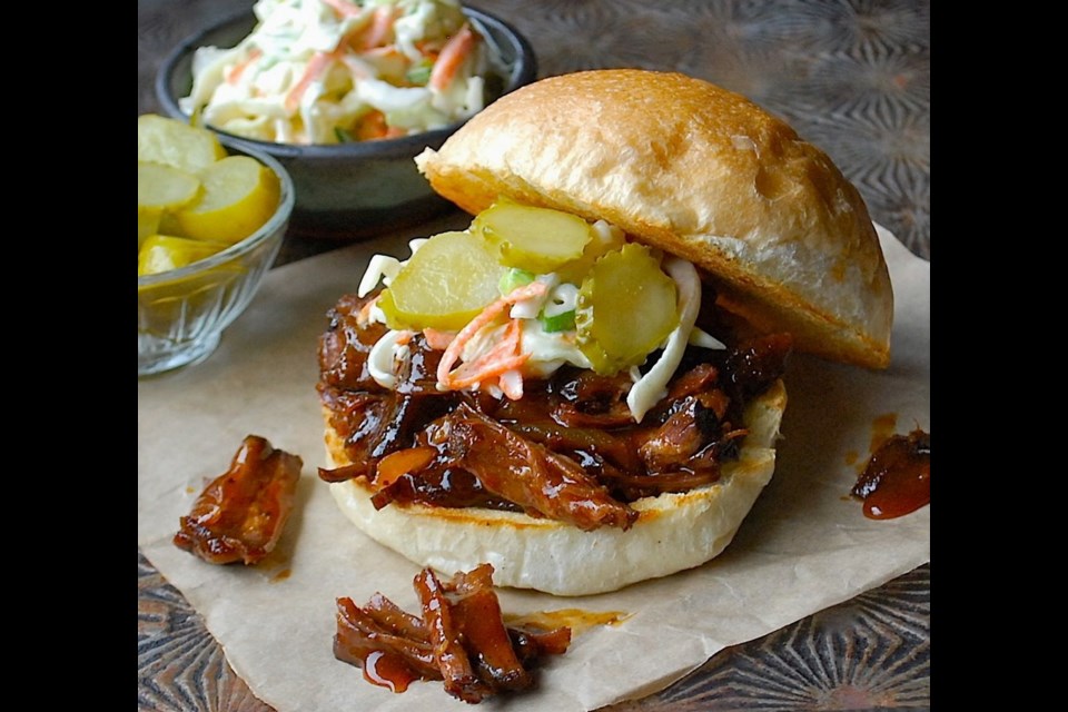 In Pulled Short Rib Sandwiches, saucy shreds of beef are topped with coleslaw and pickles.