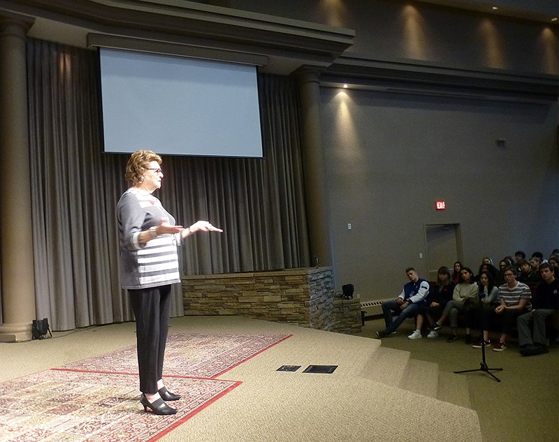 Mariette Doduck spoke of her childhood experiences as a Jewish child on the run during WWII. She was the guest speaker at the 11th annual symposium on the holocaust hosted by Dr. Charles Best secondary school and held at Coquitlam Alliance Church Wednesday.