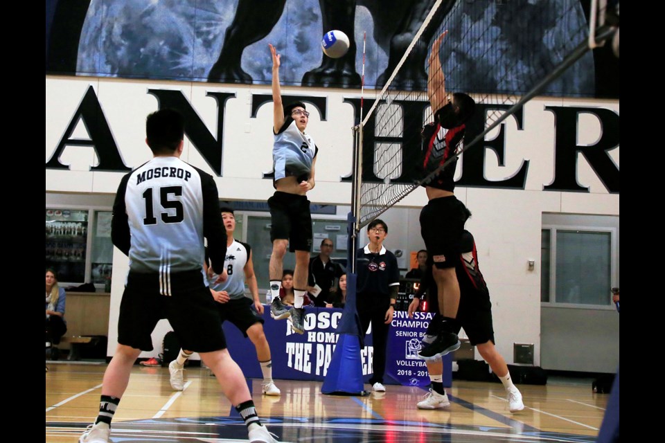 Moscrop's William Khor goes vertical to power a shot into the Burnaby Central court during Wednesday's league playoff final.