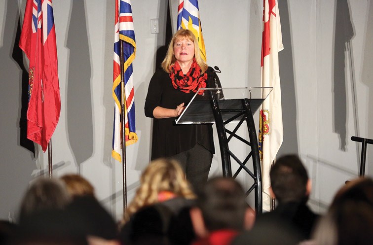 Memorial Cross Mother Colleen Fitzpatrick speaks on Sunday morning at the Prince George Civic Centre during Remembrance Day ceremonies.