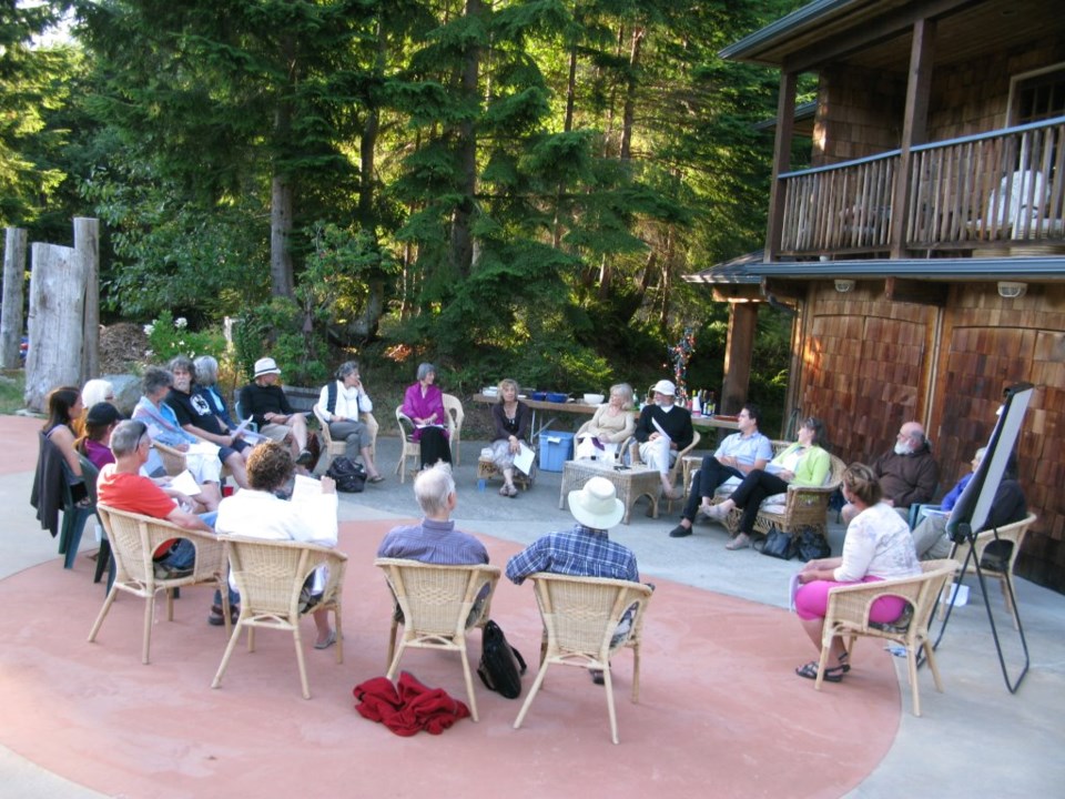 Members of Bowen in Transition, sitting in circle.