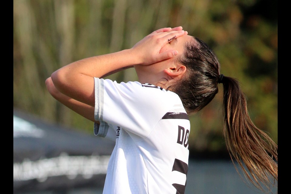 Douglas College Royals forward Sofia Flores-Aguilera laments a missed scoring chance in the team's second round match against the SAIT Trojans. The host squad demonstrated plenty of moxie in shaking off an opening 4-0 loss to advance to the third-place game.