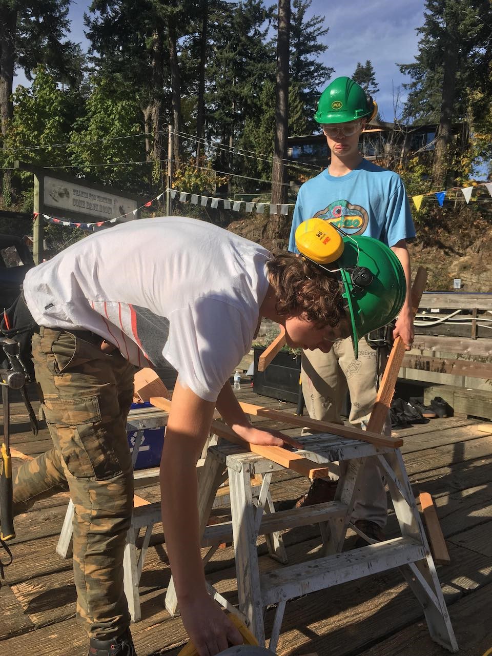 High school students working on the bike barn.