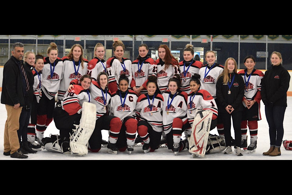 Richmond Ravens rolled to five straight wins to capture Kamloops Minor Hockey Association's Midget Rep Tournament and also delivered the 1,000 win of AJ Sander's coaching career.