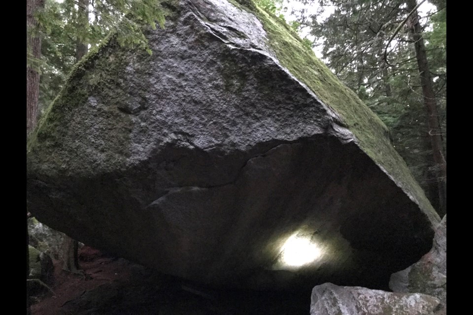 A headlamp illuminates the low start to Lesson 6. It was discovered that someone had chipped the start of the route, presumably to make it easier to ascend.