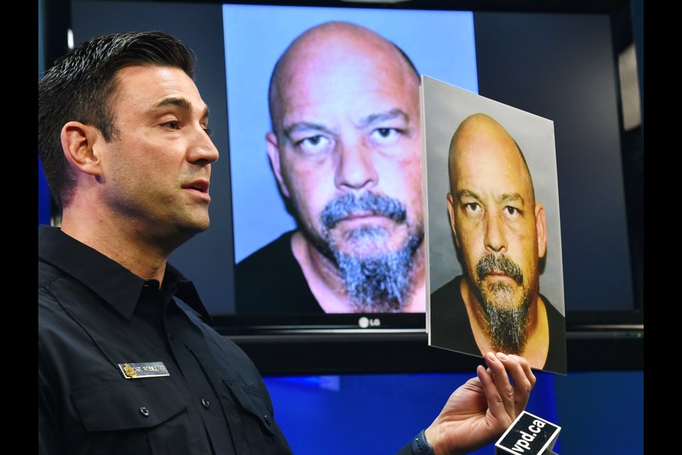 Vancouver police Sgt. Jason Robillard shows a photo of Kevin Alexander Roberts, 46. Roberts was arrested Monday and is facing several charges for alleged historical sexual assaults against a young girl. Investigators believe there may be more victims that have not yet come forward. Photo Dan Toulgoet