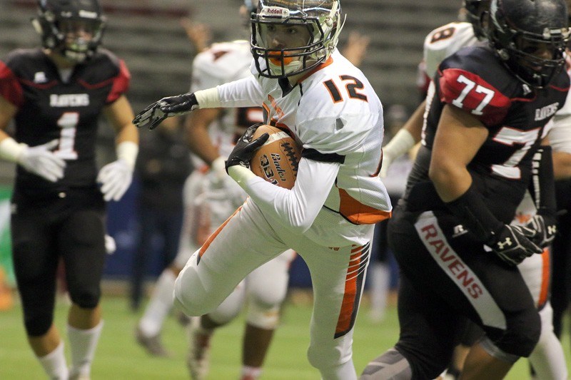 New Westminster Hyacks running back Greyson Planinsic heads for the end zone in their AAA Subway Bowl semifinal win over the Terry Fox Ravens on Saturday at BC Place Stadium.