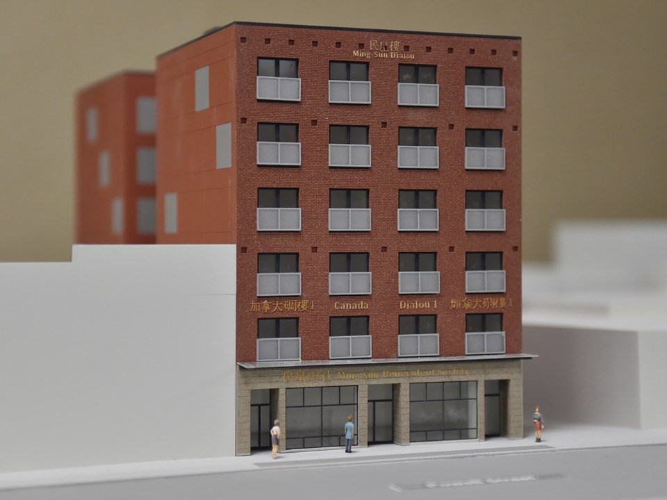 A model of the mixed-use building that will be constructed on the site. Photo Dan Toulgoet