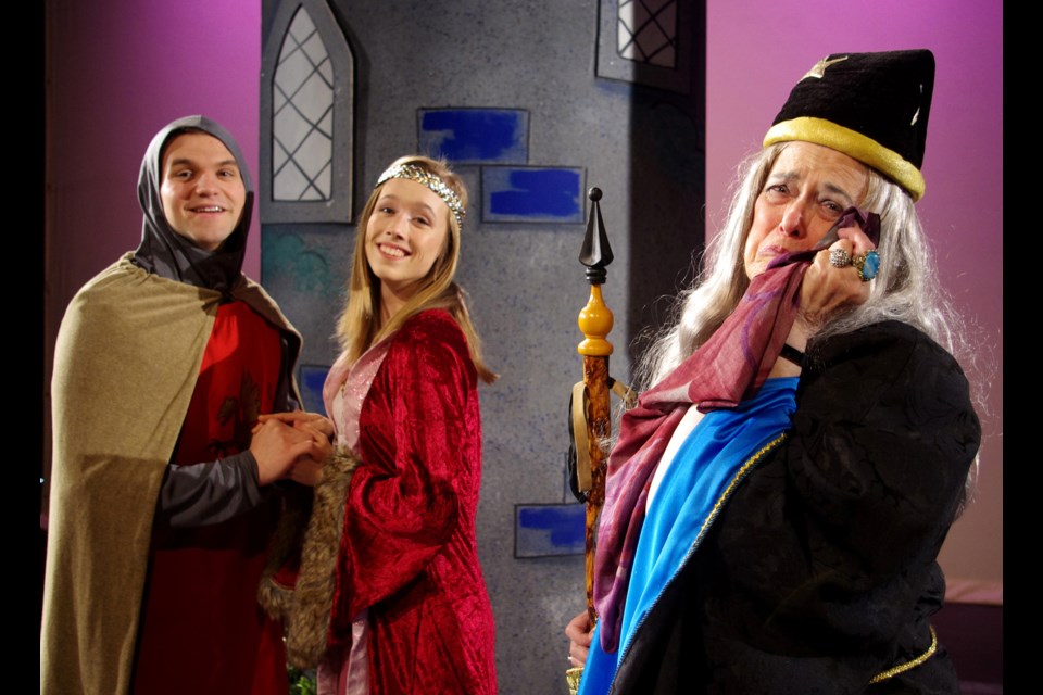 Colton Fyfe as King Arthur, Megan Greenwood as Guinevere and Sue Sparlin as Merlin in the Metro Theatre production of King Arthur's Court.