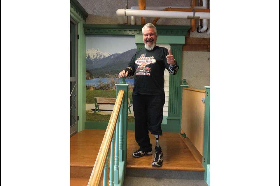 Motorbike accident survivor John Sayer takes his first step with his new leg. Photo submitted