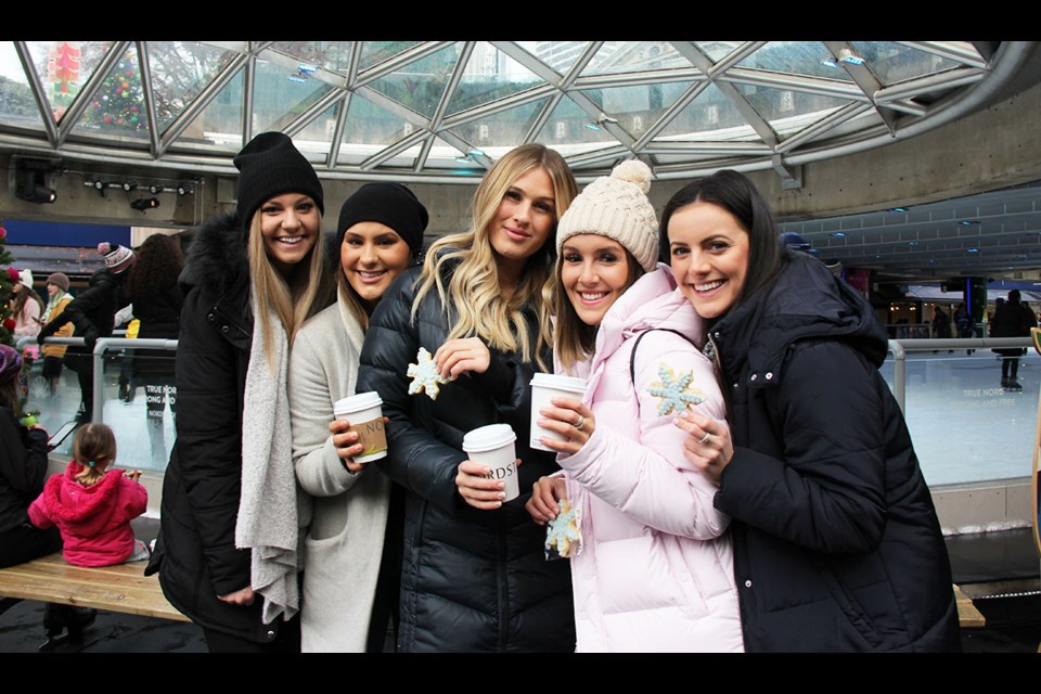 Emily Jenkinson, Nicola bonnell, Becky Braun, Emma Rose and Sarah Jenkinson take a break from the ice to have a hot chocolate and a cookie.