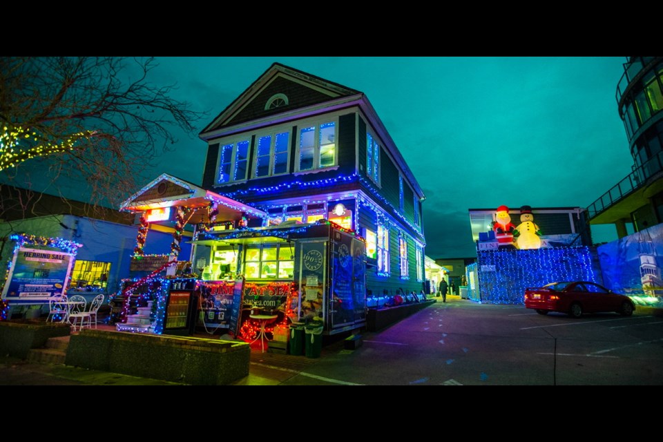 Sea of lights in James Bay: Christmas lights decorate the Finest at Sea Seafood Boutique on Erie Street.