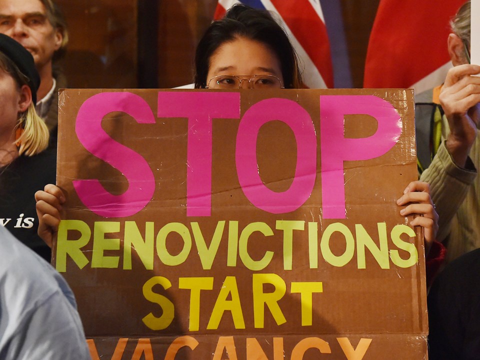 One of the signs at a renters' rally held before council voted on the renovictions motion. Photo Dan