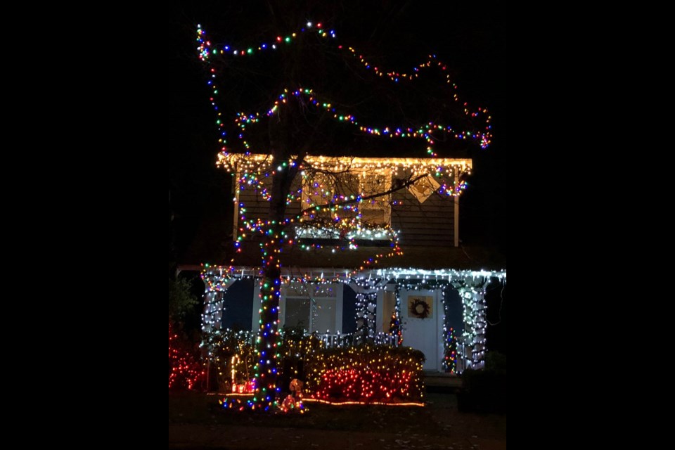 Before: Lance Murdoch took advantage of last weekend’s good weather to hang lights at his Queensborough residence and in the tree in front of his house. A couple days later, a contractor unexpectedly arrived and trimmed the tree - and removed lights from the tree that's on city property.