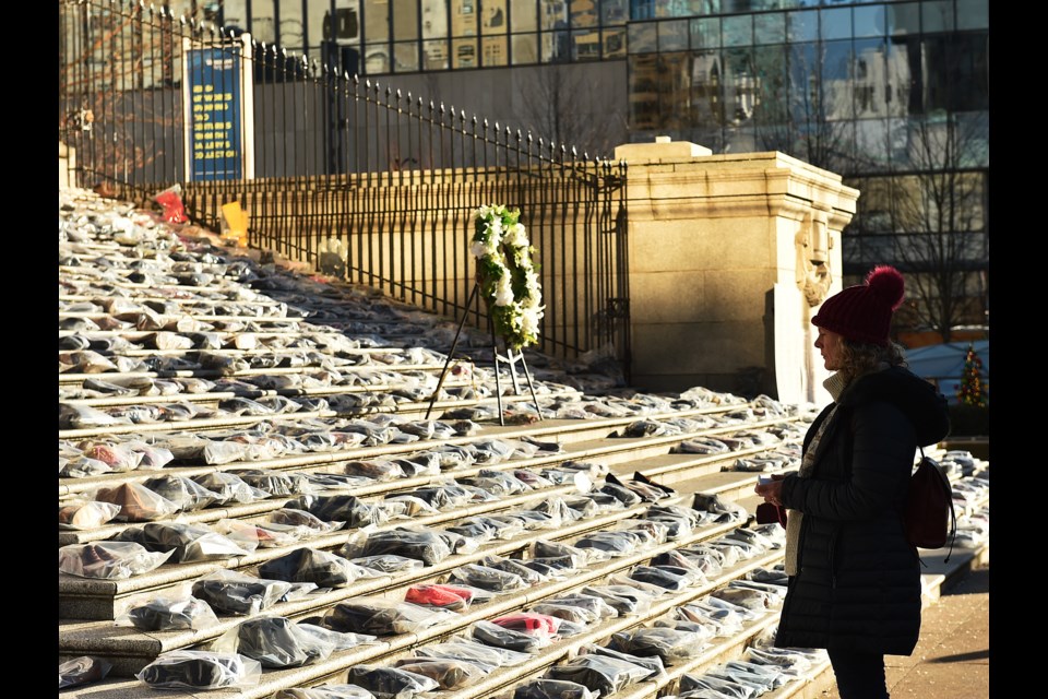 The 16th annual Vancouver Shoe Memorial took place Thursday, Dec. 6, on the steps of the Vancouver Art Gallery. The event honours the memory of murdered B.C. women. Photo Dan Toulgoet