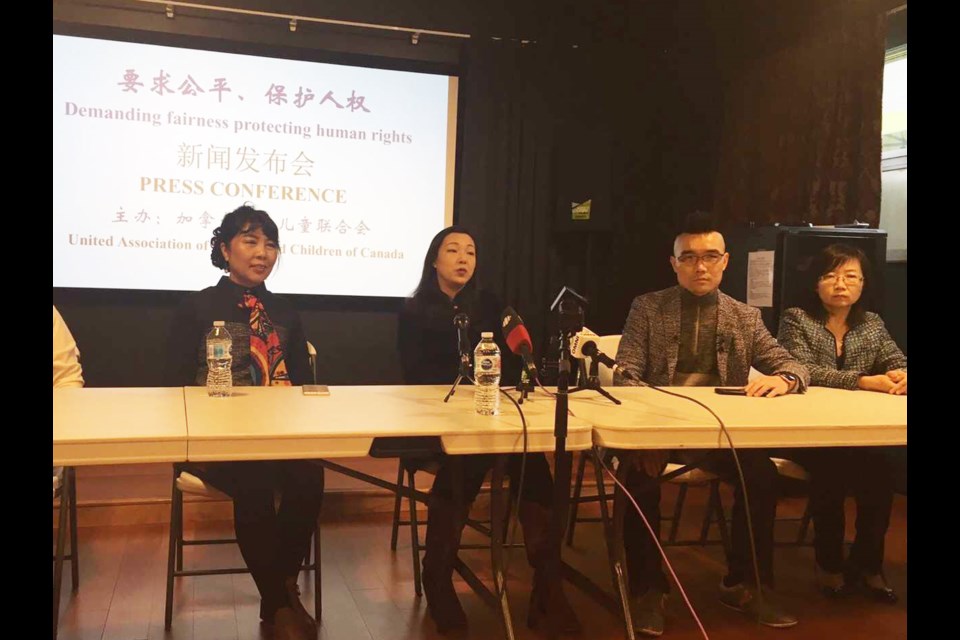 Richmond lawyer Hong Guo (far right) and the president of United Association of Women and Children of Canada, Dongmei Han (Left) ask the Canadian government to release Huawei CFO Wanzhou Meng. Photo submitted