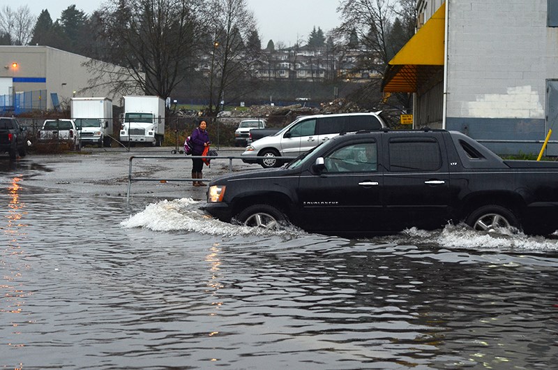 The intersection of Douglas Road and Still Creek Avenue was flooded Thursday after heavy rainfall.