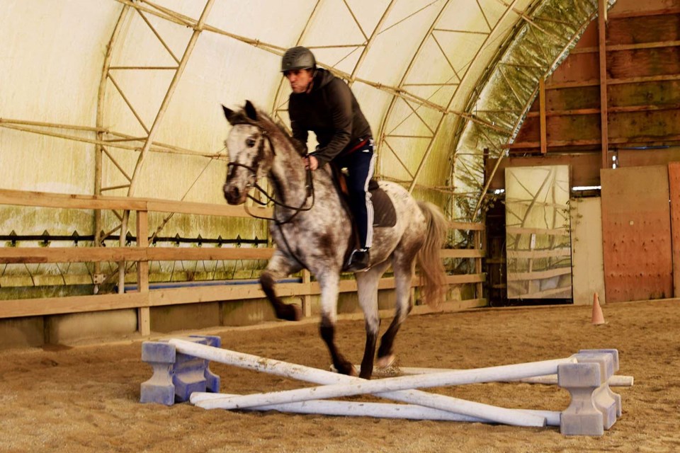 Alan Campbell, on Yetter, takes his first jump on his ninth and final lesson. Megan Devlin photos