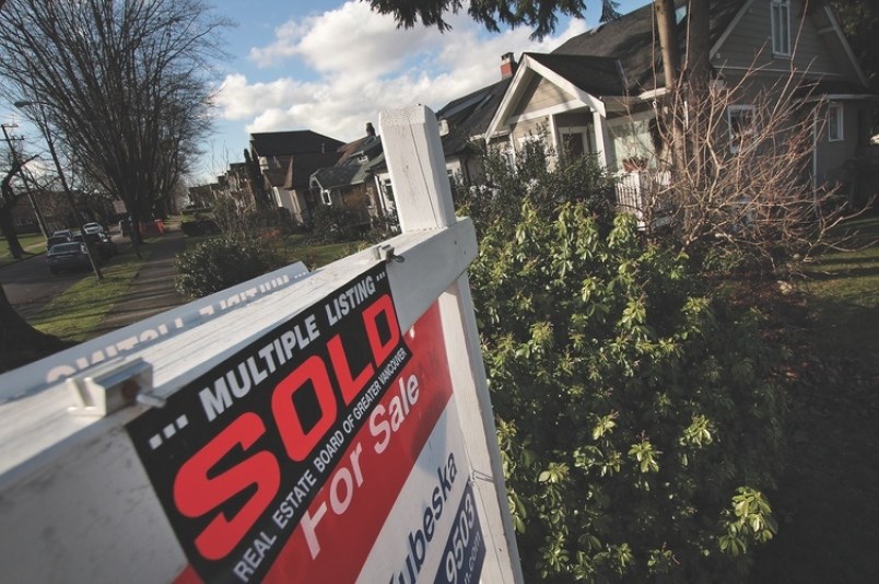 home sale sign winter vancouver real estate rob kruyt