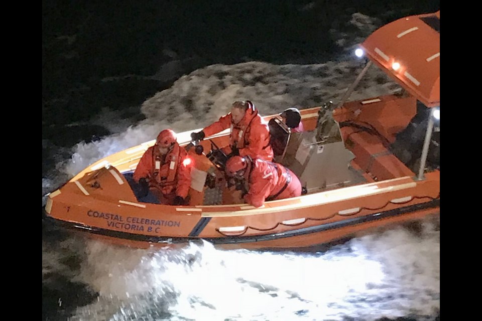 A B.C. Ferries crew respond to a boat in distress near Moresby Island on Monday, Dec. 17, 2018.