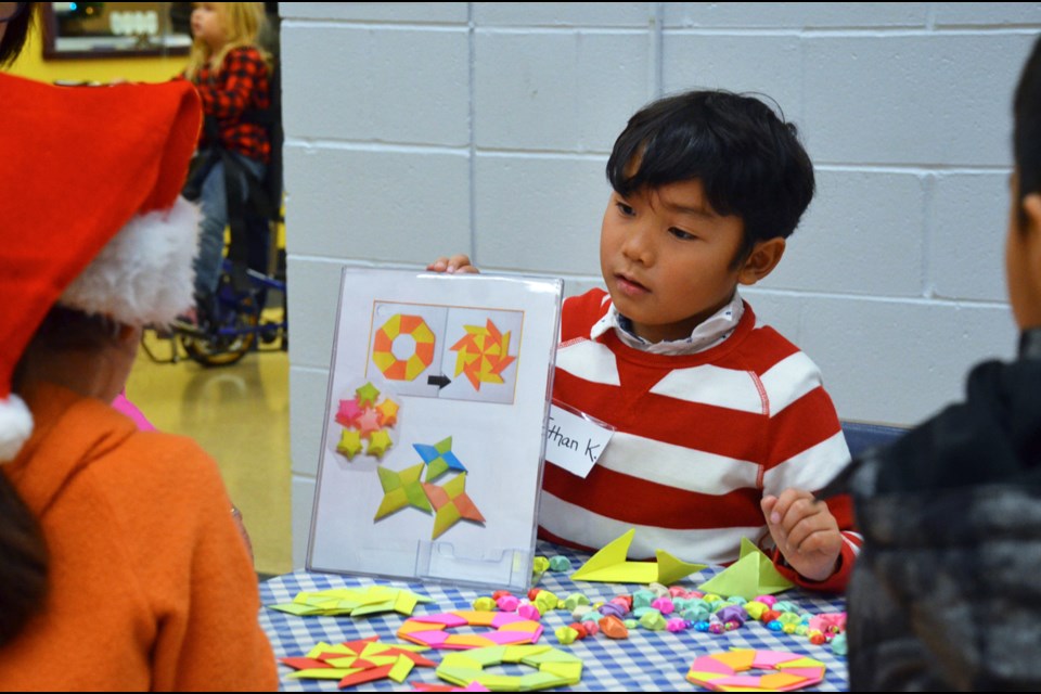 Grade 4 Queen Elizabeth Elementary student Ethan sold handmade origami at the school’s young entrepreneur fair on Dec.19.