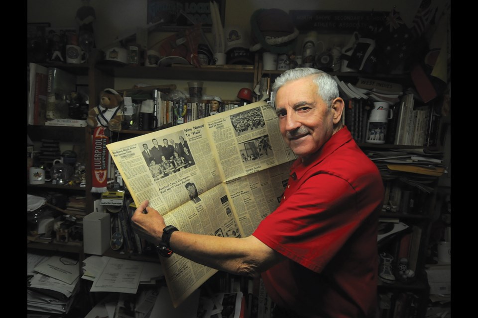 Sport historian Len Corben holds the North Shore Citizen newspaper which featured the first ever class inducted into the North Shore Sports Hall of Fame in 1968. The hall has been dormant since 1971 but Corben is leading a committee that will bring it back to life in 2019. photo Mike Wakefield, North Shore News