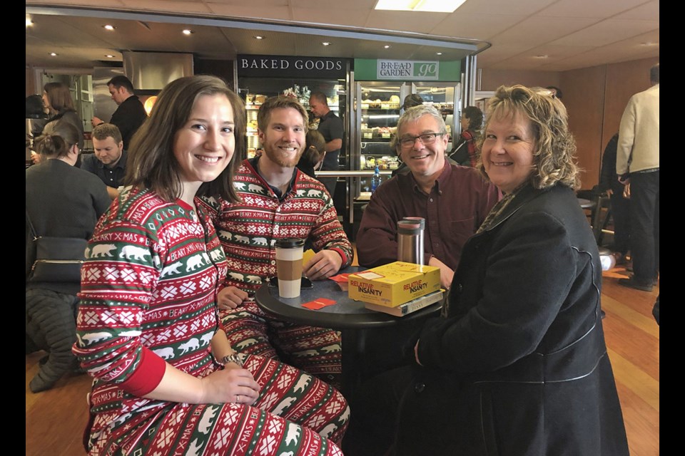 Siblings Allison and Neil Dentoom and their parents André and Kelsey of Ladysmith. Photograph by Katie DeRosa/Times Colonist.