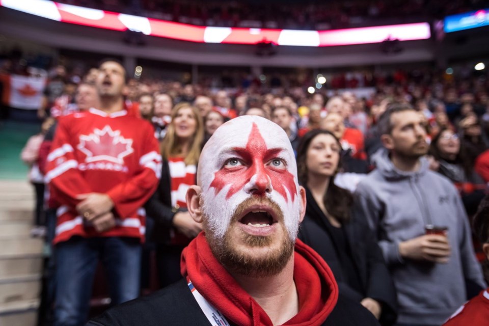 Joey Siembida, of Fort McMurray, Alta., sings O Canada before Canada and Denmark play an IIHF world junior hockey championship game in Vancouver, on Wednesday Dec. 26, 2018.