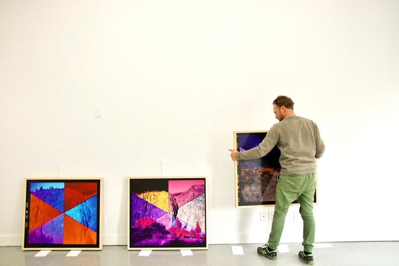 Scott Massey prepares for Terminal Creek Contemporary's opening show back in May.