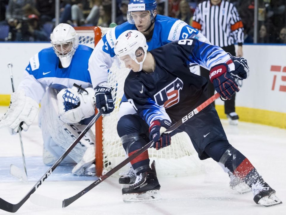 Tyler Madden carries the puck for Team USA at the 2019 World Juniors