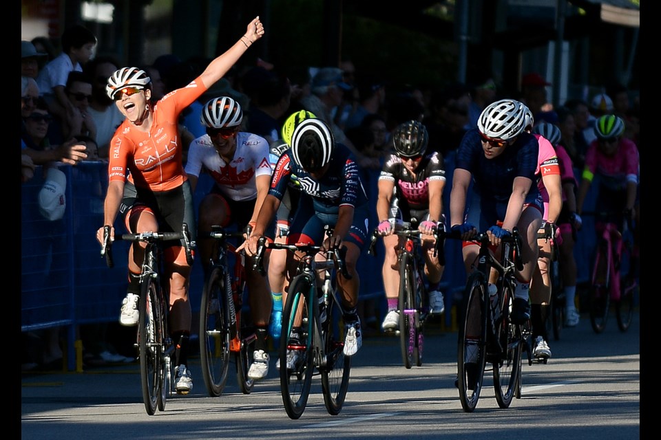 Celebrating her victory at the Giro de Burnaby is Rally Cycling's Summer Moak, at left. It was a victory that came through team work and patience, she said.