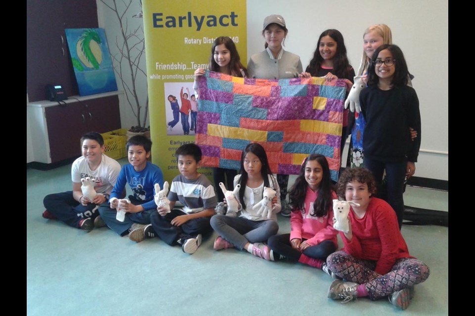 Students at Grauer elementary make stuffed puppets and sewed quilts for those in need. Photo submitted